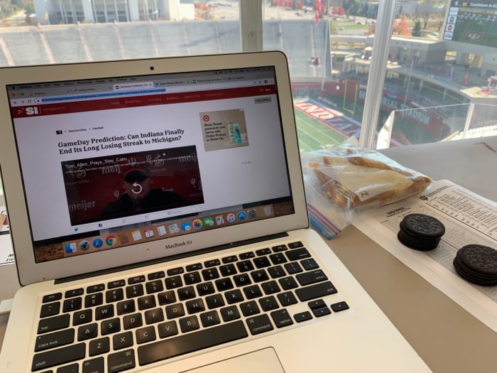 BYO lunch in the Memorial Stadium press box. Going all in "Rounders'' style on Oreo cookies.